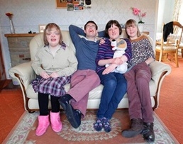 Claire Donaldson, James Wilkinson, Lizzie Searle and Sarah Gibson, who have just moved into a brand new house in Easingwold, North Yorkshrie, thanks to investors in the bond. (C) Golden Lane Housing (Credit: Layton Thompson)