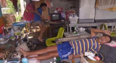 ครอบครัวพิการถูกน้ำท่วม