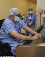 Tenacious: The tenacious doctor lost his ability to walk when a cyst burst in his spine. A year of grueling rehabilitation later, he was right back in the OR repairing joints and improving lives