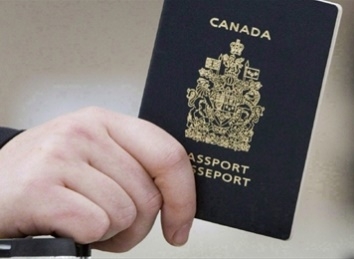 PASSPORT TOM HANSON,The Canadian Press Spectator columnist Al MacRury says he must present his passport when buying a cellphone in Ontario because he does not possess a driver’s licence.