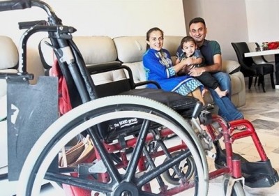 Reena with her htree-old son and husband Tushar D. Patel.
