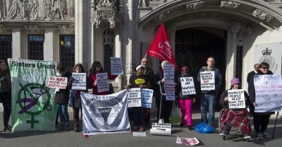 Demonstrators gather outside the supreme court in London on Monday. Photograph: Ben Pruchnie/Getty Images