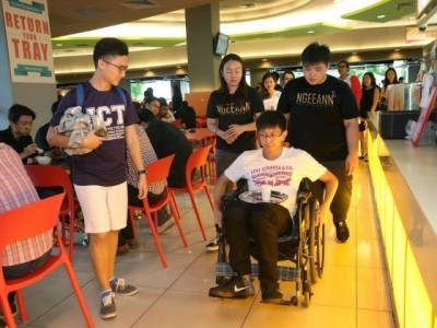 Geoffrey Cho, a student from Ngee Ann Polytechnic, taking part in the Wheelchair Challenge during the launch of "Inclusivity & Me" campaign,on 27 June 2017.
