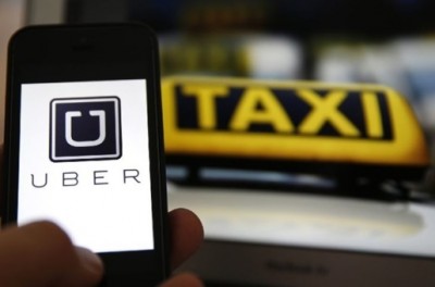 อูเบอร์ (Uber) บริษัทให้บริการรถแท็กซี่ผ่านแอปพลิเคชั่น